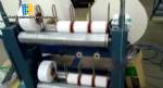 Automatic line for manufacturing diapers