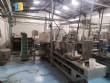 Automatic filling and sealing machine for gelatin cups, 12,000 units/hour.