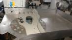 Rotating stopper press