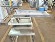 Vibrating trough for multi-head scale