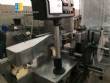 Placing of covers Erli and labeler Krones