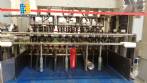 Rotary packer with 50 nozzles and 18 wrapping machines IMSB
