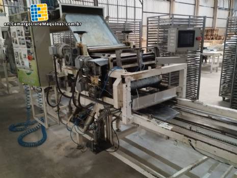 Continuous line laminator, cutter and folder for long dry pasta (tagliatelle).