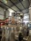 Stainless steel filling machine for beer liquids in Brabeer bottles