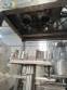 Stainless steel filling machine for beer liquids in Brabeer bottles