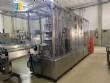 Automatic shrink tunnel applicator for EPET sleeve labels from Brazil