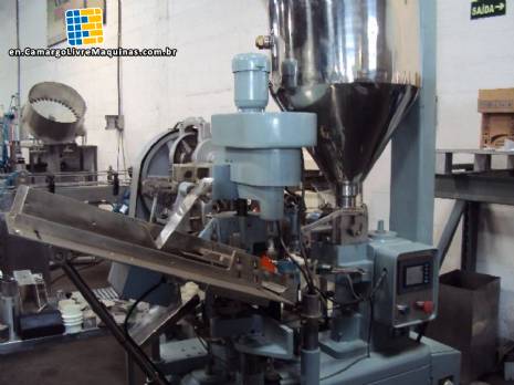 Filling and automatic closing for cosmetic metal tube Tonazzi Filling and automatic closing for cosmetic metal tube Tonazzi