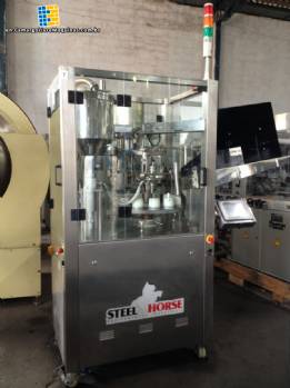 Filling machine for plastic tubes Filling machine for plastic tubes